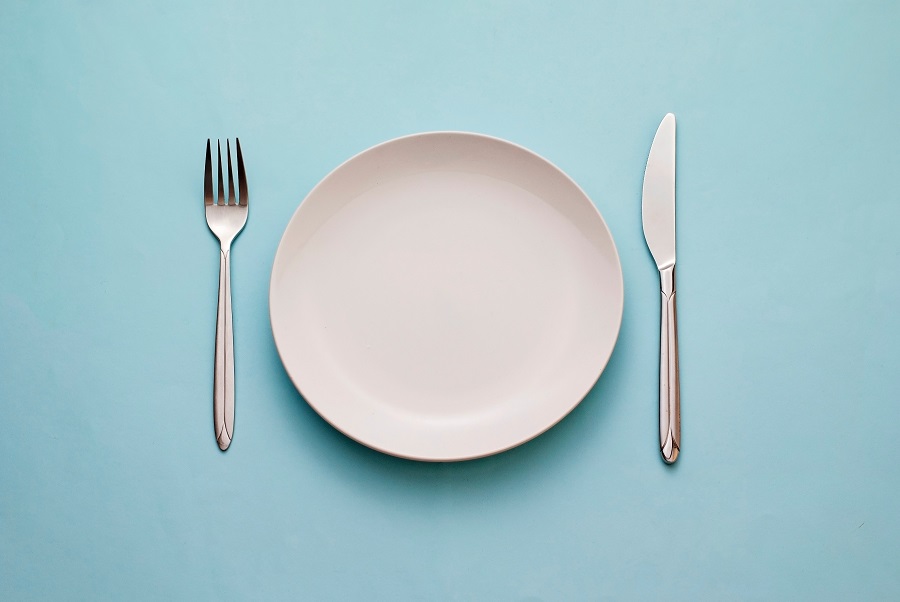 Clean empty white plate with knife and fork, by sergign. 